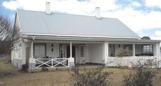 Main house has 2 bedrooms, 2 bathrooms, 2 lounges, dining room and kitchen. Guest cottage has 1 bedroom en suite.