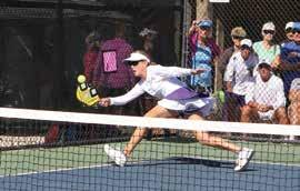 Pickleball is a paddle sport created for all ages and skill levels that Mixed Doubles in El Mirage, AZ photo by Beverly Youngren is played both indoors and outdoors.