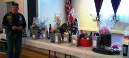 with some of the raffle prizes The event is held annually to benefit families of Parkinson s disease.