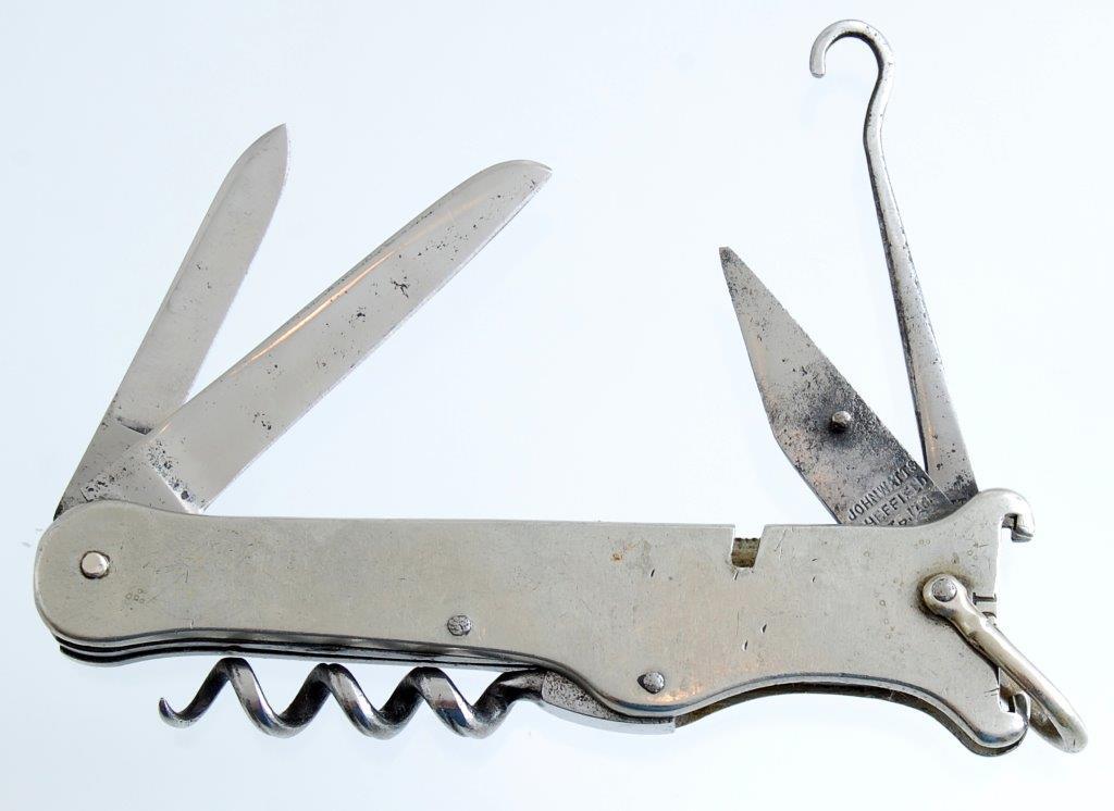 cutter, button hook, three knife blades
