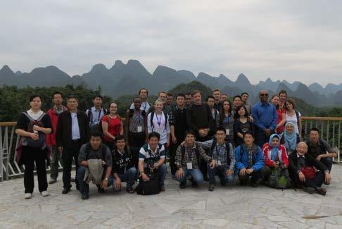Group of Chinese and international experts in front of the Institute of Karst Geology in Guilin and the statue of Xu Xiake the first Chinese traveller and geographer describing karst phenomena (16 Ct.