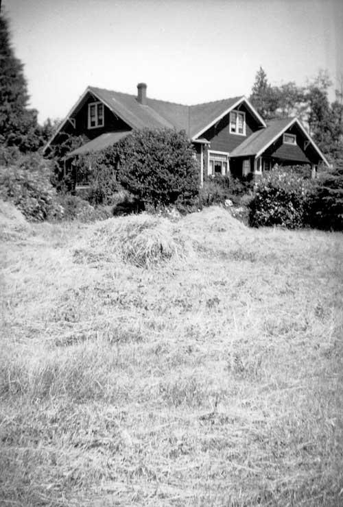 PHO Rush House and surrounding hay field,