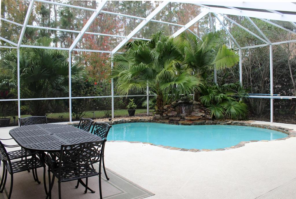 RELAX BY THE POOL Covered lanai and fully screened patio