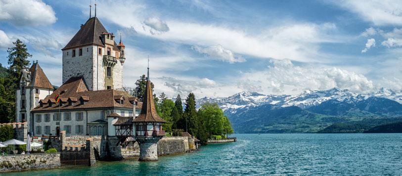 INTERLAKEN Oberhofen Castle, Lake Thun INTERLAKEN is surrounded by blue-green lakes, picturesque chalet villages and eternally white mountain tops.