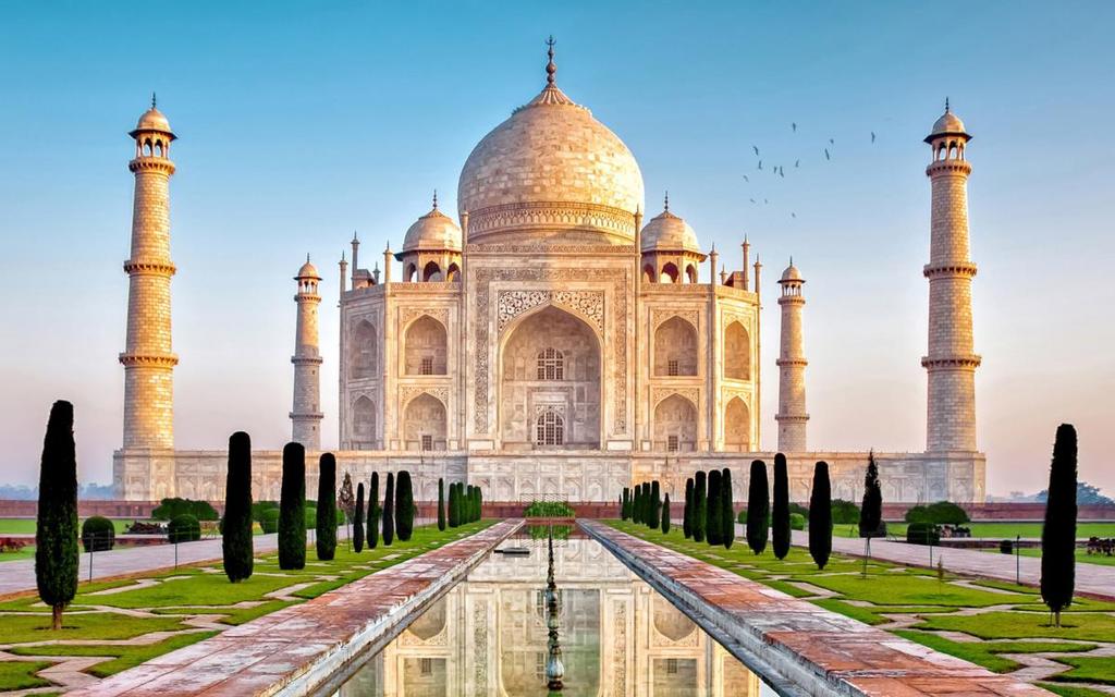 a crenellated wall. Opening hours: opens 30 min. before sunrise and closes 30 min. before sunset How to reach Taj Mahal By Air: you can get a direct flight to Agra from New Delhi.