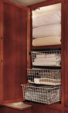 PULL-OUT BASKETS in the bedroom slide in and out with ease for your extra linens, towels or clothing.