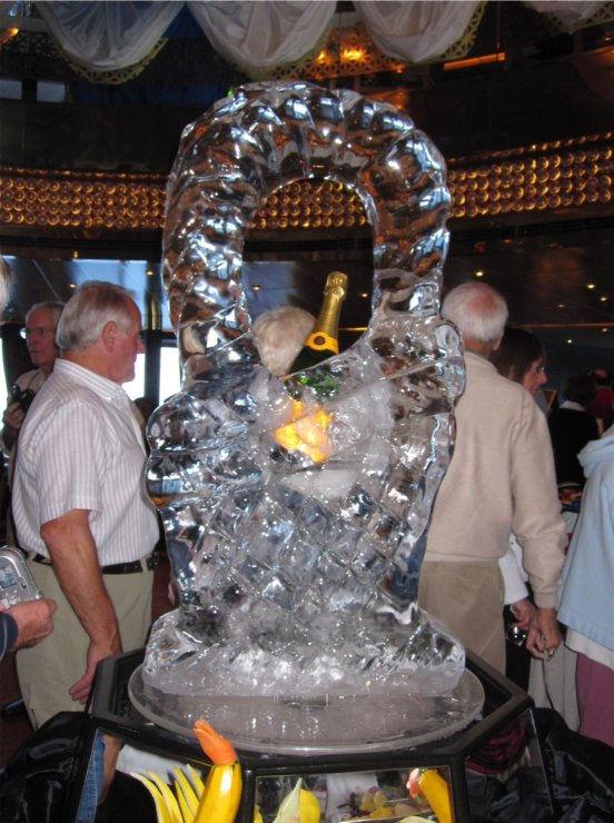 They had created a basket made of ice, as shown on the right, to carry the champagne used to celebrate the Mariner Day event. One of the signature features of cruising is the fine food that is served.