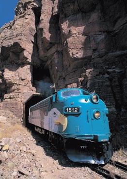 The train passes through astonishing remnants of a booming copper industry which shaped the valley.