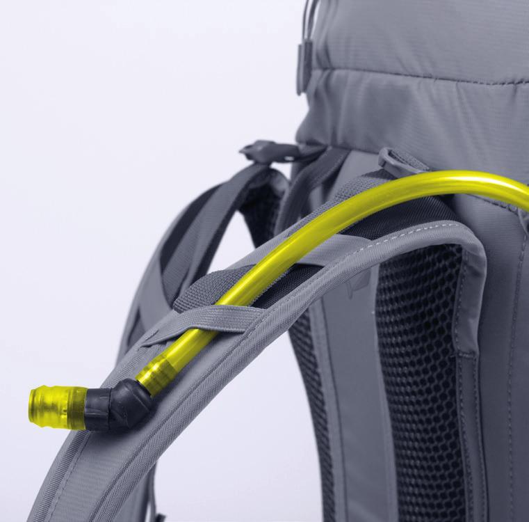 Fasten the hydration system either with the sewn in hangers or velcro.