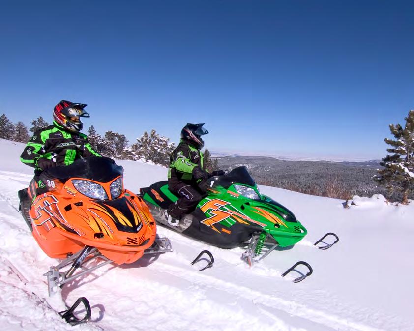 BLACK HILLS SNOWMOBILE TRAIL SYSTEM WHEN: Mid-December through end of March, weather permitting WHY GO: Beginners to advanced snowmobile enthusiasts love following the orange-colored diamond-shaped