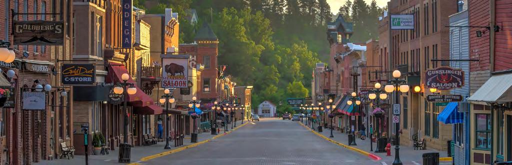 DEADWOOD MAIN STREET WHERE TO STAY The western corner of South Dakota is filled with a string of quaint, charming towns that light up during the summer with live-theater performances, lively