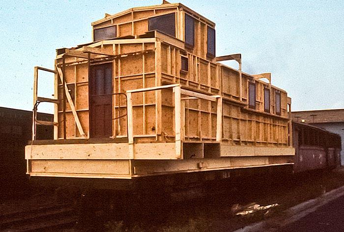 Dick Hunter, who took the photograph, explains: I found this thing sitting in the Antonito Yard in 1988. It is a one and a quarter-sized caboose sitting on a narrow gauge flat car.