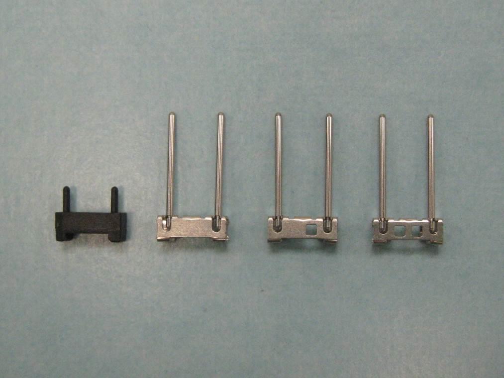 7.0 MTP Brand Connector Housing Assembly MTP brand connectors may be assembled as either females or males. Female connectors have a plastic pin clamp spacer with guide pin stubs (P/N 9386).