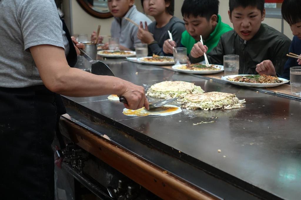 We enjoyed watching and eating okonomiyaki with a large group of school kids and their teacher.