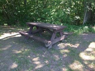 Picnic table not on an accessible route 8 27" ible route to pavilion beyond soccer field is technically iinfeasible.
