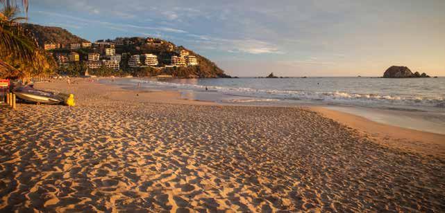 Down the road, Zihuatanejo is the laid-back, free spirit, a quaint fishing village with winding streets of galleries, folk art shops, and beachfront palapa-style restaurants.
