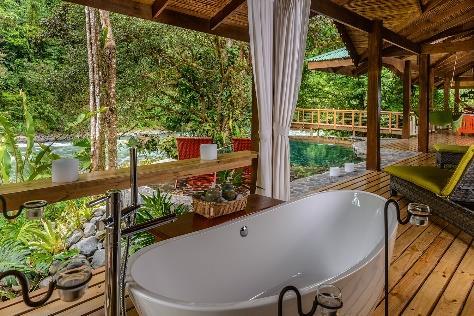 As you round the bend, you ll spy the indigenous-style facilities of the Pacuare Lodge.