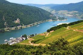 RHINE RIVER The Rhine River s source is in the Alps in Switzerland Runs north becoming the border between Switzerland and