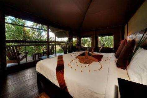 Inclusions 3 nights Little Kwara Camp, private Kwara Concession Okavango Delta includes all meals, selected beverages, laundry, activities/concession fees day and night game drives, guided walks,