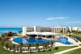 The resort boasts 649 junior suites, ten restaurants, seven bars, water sports, and daytime activities.