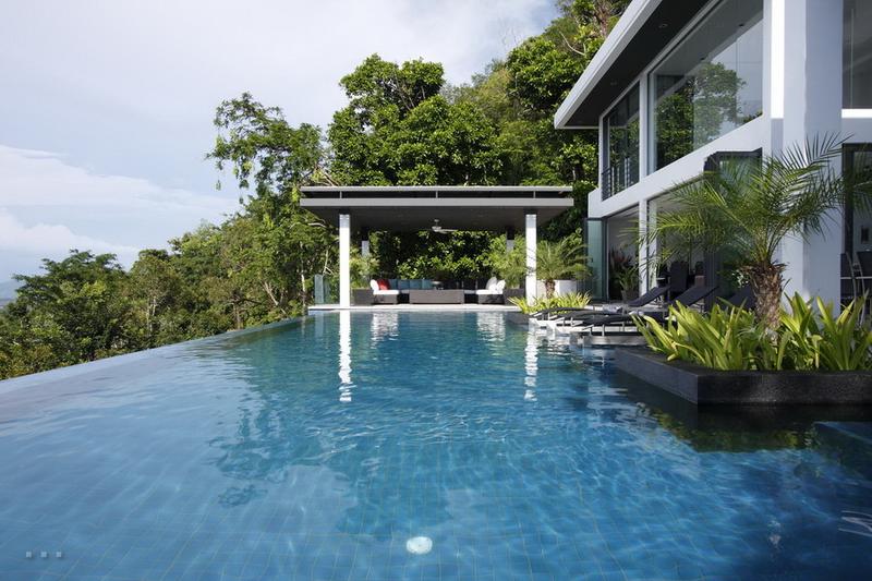 the prestigious Bang Tao and Laguna seaside resort/residential area. This Vlila, a four-level, five-bedroom pool villa, is the newest of Thailand s ultra-elite vacation homes for rent.