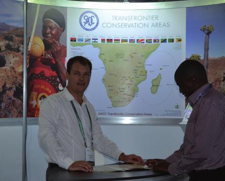 3 Delegates at the World Parks Congress visiting the SADC TFCAs stand situated in the exhbition hall.
