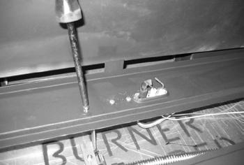 6. Secure the burner tray to legs using eight screws (Fig.