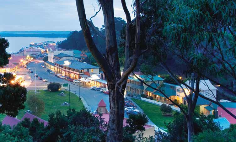 HOTELS & LODGES 2 Clockwise from top: Soak up the beautiful dusk in a guaranteed harbour view room at Strahan Village. Reflect upon natural wonder at Peppers Cradle Mountain Lodge.