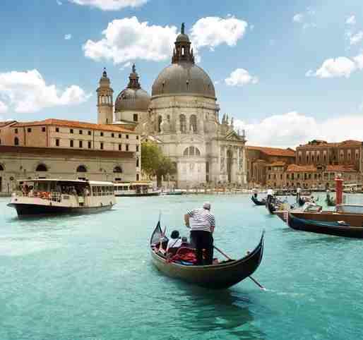check-out, and board the coach to Venice. Arrive at Venice. Have Lunch at a Restaurant. Later proceed to the pier, board the boat which takes you to the heart of the traditional city of Venice- St.