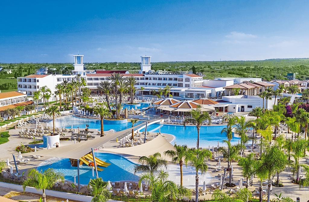 THE RESORT OLYMPIC LAGOON RESORT AGIA NAPA not just a resort, but a complete destination As you approach Agia Napa, the low-rise Olympic Lagoon Resort overlooking Landa Beach makes its first