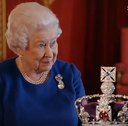 It s thought she has never watched the footage of her coronation before. And there is an equally rare glimpse of the Queen s sense of humour as she examines the Crown Jewels her Crown Jewels.