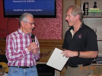 Marv Rifkin presented a certificate of appreciation to Andrew Rorke for his interesting and informative talk on (mostly) Southern California weather.
