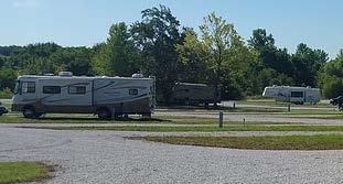 Can accommodate various size RVs Wi-Fi, restrooms, showers, laundry Route 66 Grand Falls Antique Shops Powers Museum Red Oak II Walking, biking, swimming pool, picnic area Follow I-49