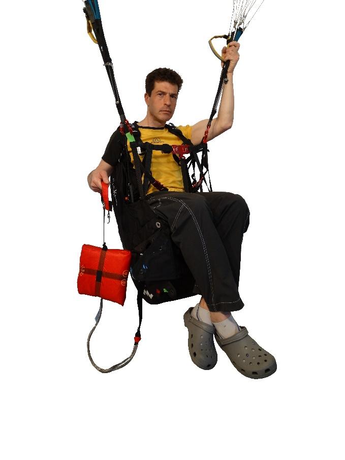 ATTENTION: Every new combination of reserve parachute and harness or the external container assembled for the first time should be tested by an official harness or reserve parachute dealer, or by a