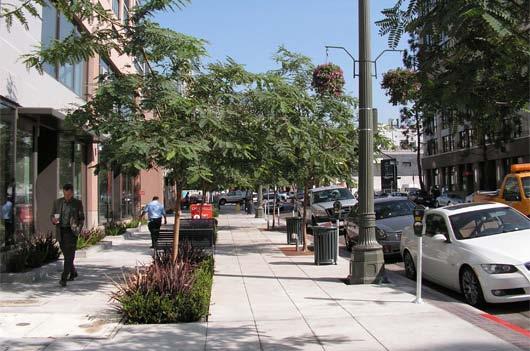 Buffer from Travel Lanes Reclaim Street Space for Higher and Better Use