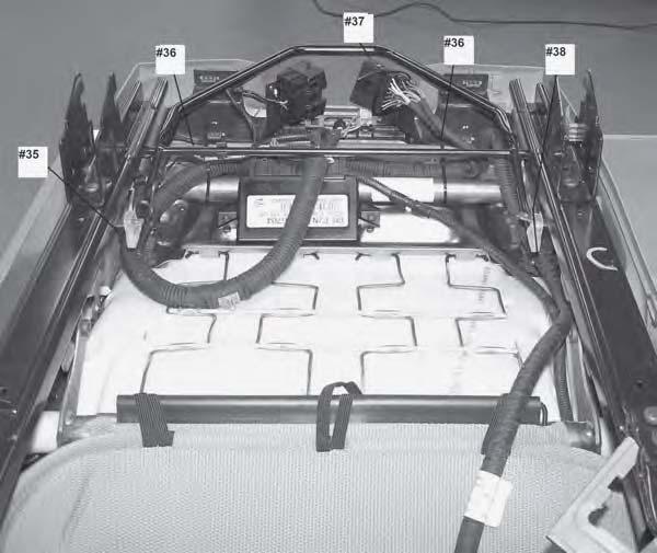 See Figure 33: 34. Connect driver s seat harness (from kit) to module. 35. Secure harness rosebud to seat frame.