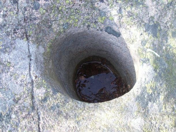 A pothole is a cavity or hole which has been drilled in the surrounding rocks by eddying currents of water bearing stones, gravel and other detrital matter 4. w www.swisseduc.
