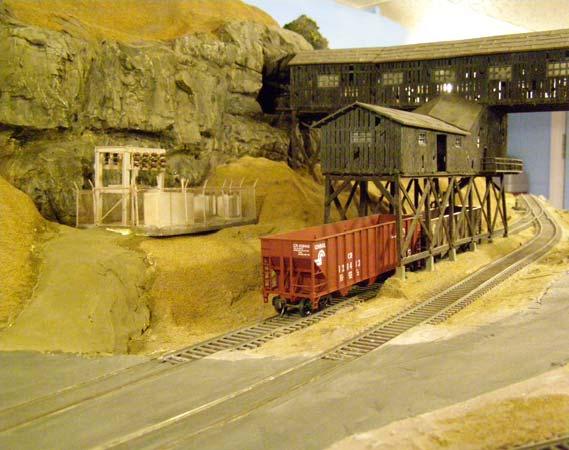 When operating sessions begin in a year or so, it will feature unit stack, trail-van, and automobile trains from and to the ports, mine runs, power-plant coal trains, and also have commuter railroad