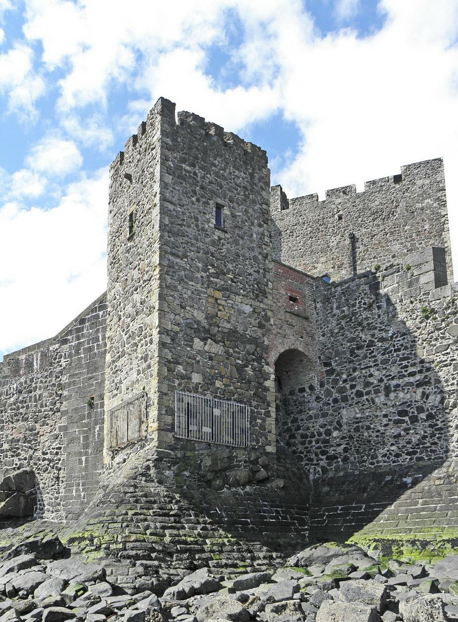 Fig. 28. Carrickfergus Castle. The East Tower, added by King John, c. 1210-15, from the north.