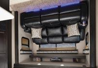 blue LED accent lighting and handy cup holders. Shown with an optional 32 LED TV.