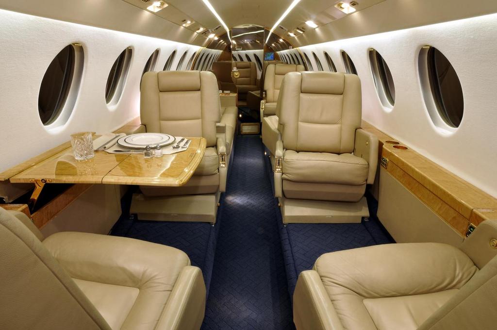 INTERIOR Forward Cabin INTERIOR DESCRIPTION Completed September 2001 by Dassault Falcon Jet Little Rock Nine-passenger interior with four forward chairs in a club grouping with two pull-out tables;