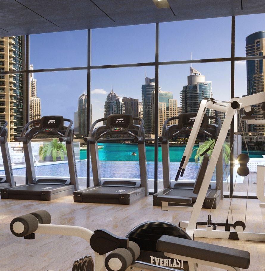 LIV WELL Wellness with a View WORKOUT IN THE STYLISH GYM OVERLOOKING THE INFINITY POOL AND PANORAMIC VIEW OF DUBAI MARINA.