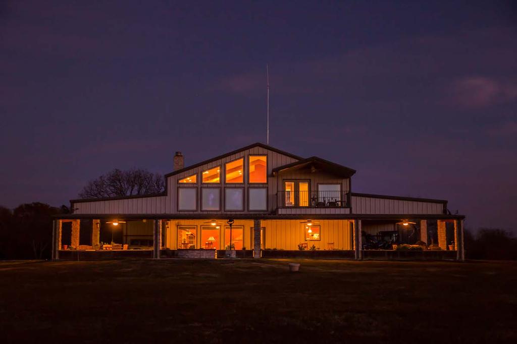 Hopkins County, Texas 270+/- Acres LODGE & RANCH HEADQUARTERS: Surrounded by spacious covered porches, the lodge is a well - constructed steel frame structure with an r-panel exterior tastefully