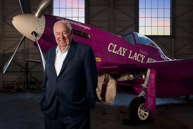 About Clay Lacy An airline captain, military test pilot, air race champion, aviation record-setter and aerial cinematographer, Lacy has accumulated more hours flying jets than anyone on Earth.