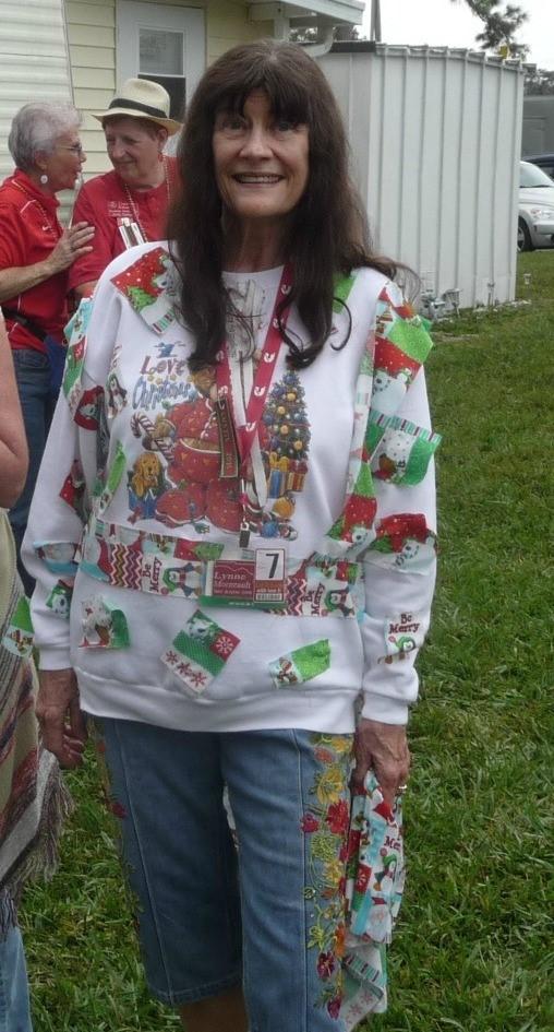 Hostess: Linda Voyton Joan Conway and Charlie Lynne Morneault In their ugly sweater WE RE ON THE WEB;