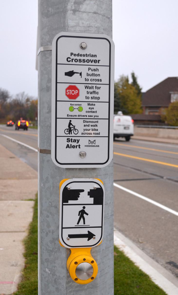 This is a new piece of traffic infrastructure for our city and will take some getting used to by both pedestrians and motorists. Pedestrians must push the button indicating they want to cross.