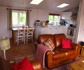 4 metre wide veranda and panoramic view of the marina, Hazel Lodge has everything required for a 5 star self catering holiday within a tranquil