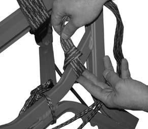 Loosening the strap will cause the front of the platform to drop. To loosen, pull the buckle away from the tree. as shown in Figure 18. Step 9.