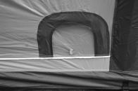 2/ Pull out the fabric of the tent so that the sewn in groundsheet is flat and free from creases or folds.