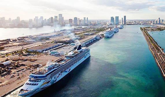 I Cruiselines line up in the Miami cruiseline port. At the same time, cruise ship passenger arrivals are predicted to grow by one to two per cent, as the summer re-deployment of ships continues.